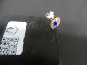 Anel Dourado com Pedra Azul e Strass