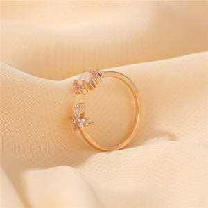 Anel Dourado Flor Estrela Strass Branco
